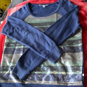 A crew neck shirt that has sparkles